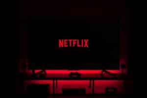 flat screen television displaying Netflix logo